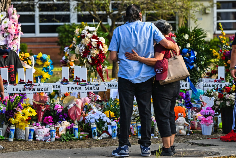 Mourners at a makeshift memorial at Robb Elementary School in Uvalde, Texas, on May 28, 2022. 