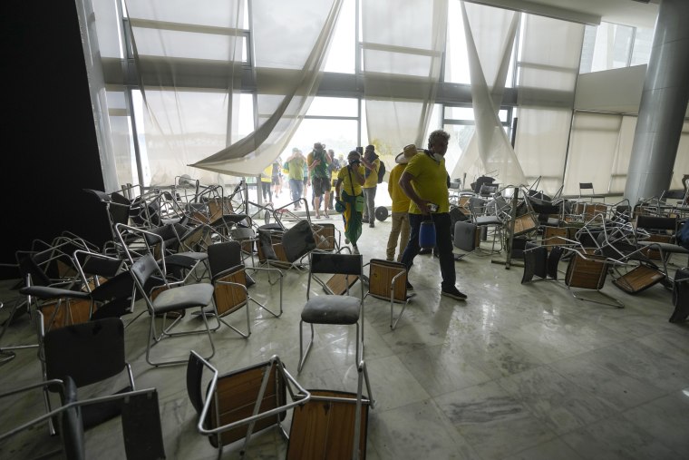 Supporters of Brazil's former President Jair Bolsonaro storm the the National Congress building in Brasilia on Jan. 8, 2023.