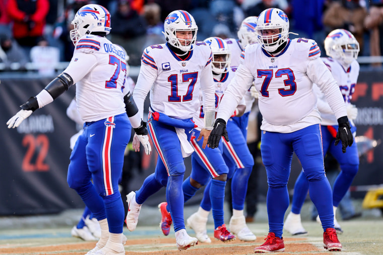 Buffalo Bills players celebrate a touchdown during the fourth quarter in the game against the Chicago Bears on Dec. 24, 2022, in Chicago.