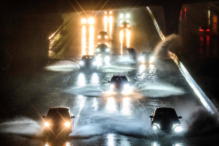 Drivers barrel into standing water on Interstate 101 in San Francisco on Jan. 4, 2023.