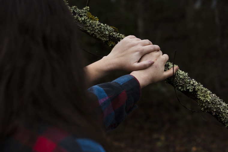 Marcella and her daughter Riley, 15, at their home in Cherokee County, N.C., on Dec. 4, 2022. Riley was sexually assaulted and later harassed by her fellow students at Andrews Middle School in Andrews, N.C.