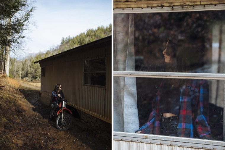 In the summer, Riley, 15, rides her dirt bike around her family's property in Andrews, N.C.  
