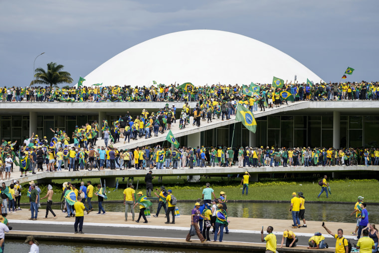 Protesters, supporters of Brazil's former President Jair Bolsonaro, storm the the National Congress building in Brasilia on Jan. 8, 2023.