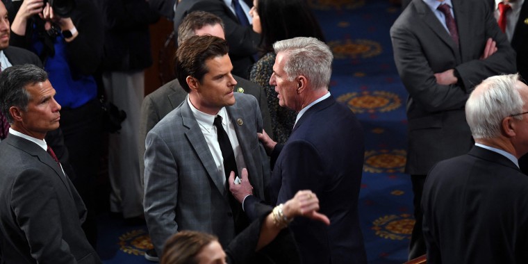 Image: Rep. Kevin McCarthy speaks to Rep. Matt Gaetz in the House Chamber.