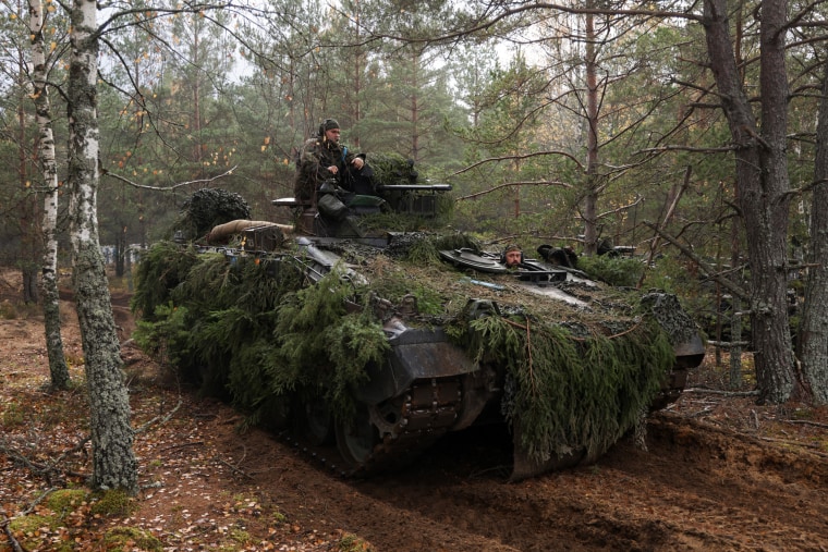 A Marder infantry fighting vehicle of the German armed forces participates in the NATO Iron Wolf military exercises on Oct. 26, 2022, in Pabrade, Lithuania.