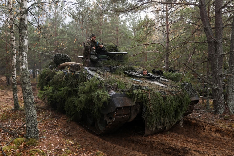 A Marder infantry fighting vehicle of the German armed forces takes part in the NATO Iron Wolf military exercises on October 26, 2022 in Pabrade, Lithuania.