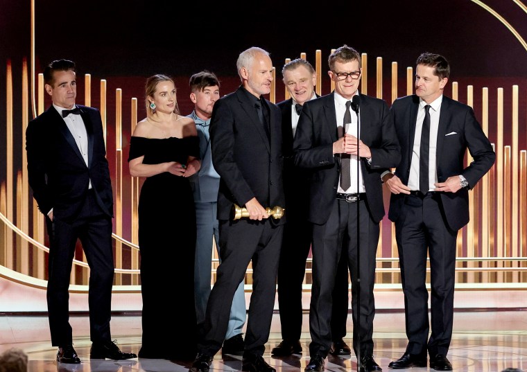 Colin Farrell, Kerry Condon, Barry Keoghan, Martin McDonagh, Brendan Gleeson, Graham Broadbent and Peter O'Brien accept the Best Motion Picture - Musical or Comedy award for "The Banshees of Inisherin"