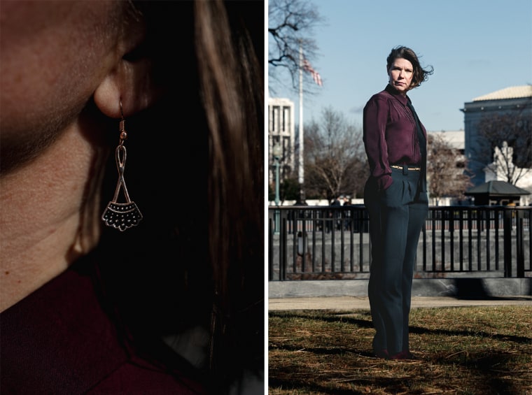 Nicole Enfield, whose earrings are inspired by the late Justice Ruth Bader Ginsburg's distinctive collars, was also arrested for protesting abortion law changes during a Supreme Court hearing in November.