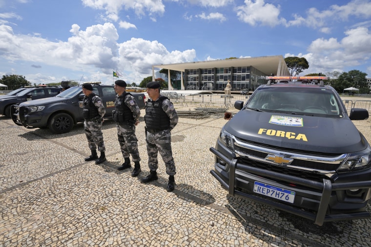 Military police stand guard outside the Suprema Court in Brasilia, Brazil, on Jan. 11, 2023.