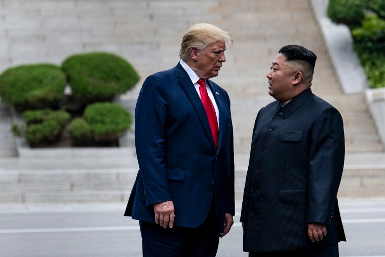 President Donald Trump and North Korea's leader Kim Jong-un stand on North Korean soil while walking to South Korea in the Demilitarized Zone on June 30, 2019, in Panmunjom, Korea.