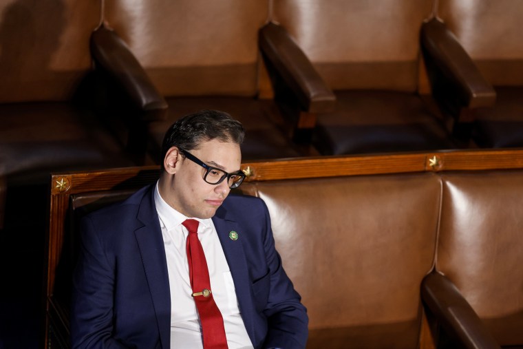 Then-Rep.-elect George Santos, R-N.Y., watches proceedings during the fourth day of elections for Speaker of the House on Jan. 6, 2023.