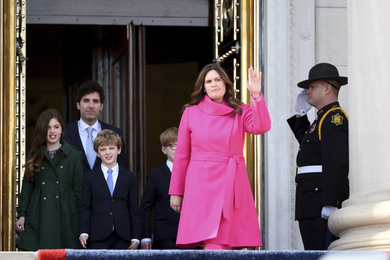 Arkansas Gov.-elect Sarah Huckabee Sanders is introduced with husband Bryan, and children Scarlett, George, and Huck prior to taking the oath of the office on the steps of the Arkansas Capitol Tuesday, Jan. 10, 2023, in Little Rock, Ark.