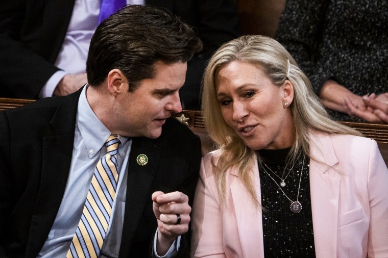 Republican Reps. Marjorie Taylor Greene and Rep. Matt Gaetz on the House floor during a vote for Speaker on Jan. 5, 2023.