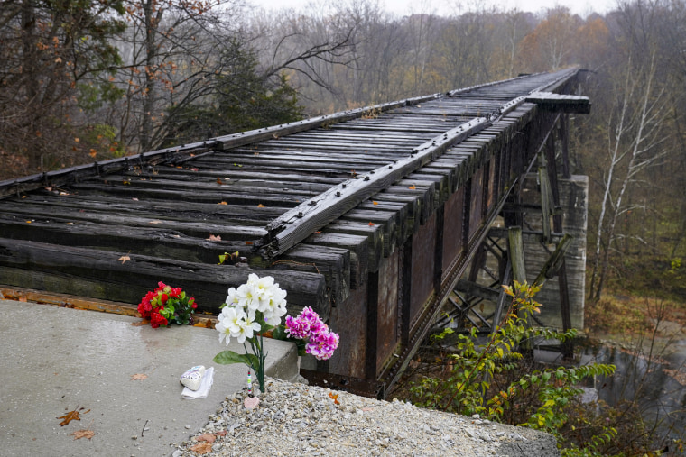 Flowers placed at the Monon High Bridge Trail in Delphi, Ind., on Oct. 31, 2022, near where Liberty German and Abigail Williams were last seen and where the bodies were discovered.