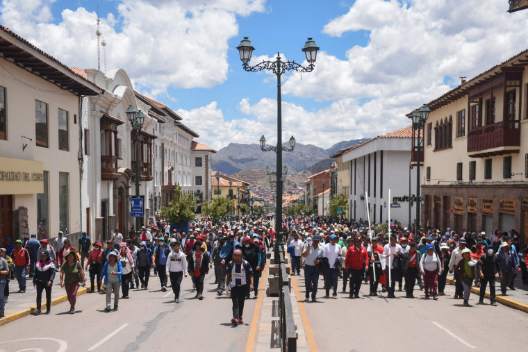 Demonstrators march in the center of Cusco, Peru