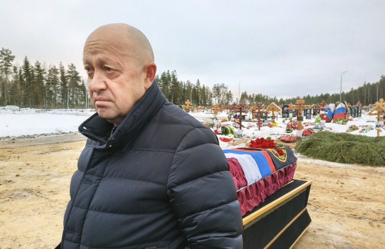 Wagner Group head Yevgeny Prigozhin attends a funeral for one of his fighters