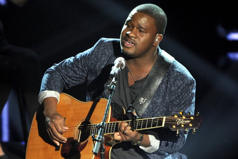 Contestant C.J. Harris performs onstage at FOX's "American Idol XIII" Top 10 Live Performance Show on March 19, 2014 in Hollywood, California.