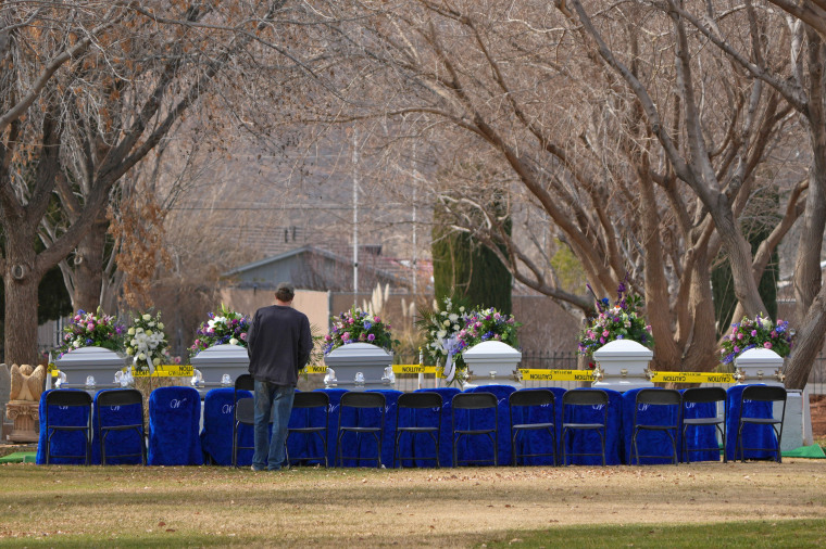 Six of the seven caskets for the Haight family on Jan. 13, 2023 in La Verkin, Utah.