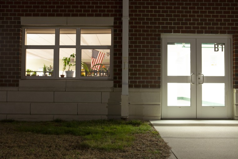 A classroom remains lit up at night at Minnechaug Regional High School. 