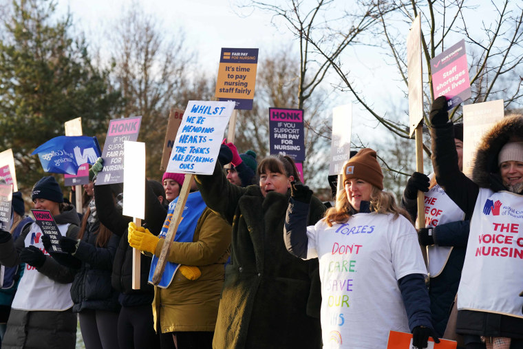 Industrial strike action in the UK as nurses join picket line. 