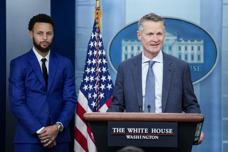 Golden State Warriors basketball head coach Steve Kerr, joined by Stephen Curry, speaks at the White House on Jan. 17, 2023.