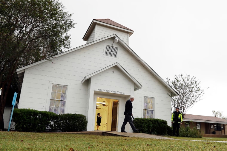 FILE - In this Nov. 12, 2017, file photo, a man walks out of the memorial for the victims of a shooting at Sutherland Springs First Baptist Church in Sutherland Springs, Texas. A South Texas church where a gunman in 2017 opened fire and killed more than two dozen congregants will unveil a new sanctuary and memorial room honoring the victims. Worshippers and relatives of those killed or injured at the First Baptist Church in Sutherland Springs are expected to gather at the newly constructed church on Sunday, May 19, 2019. (AP Photo/Eric Gay, File)