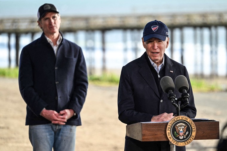 Image: President Joe Biden speaks as California Governor Gavin Newsom looks on after looking at storm damage, and speaking to those affected in Seacliff, Calif., on Jan. 19, 2023. 