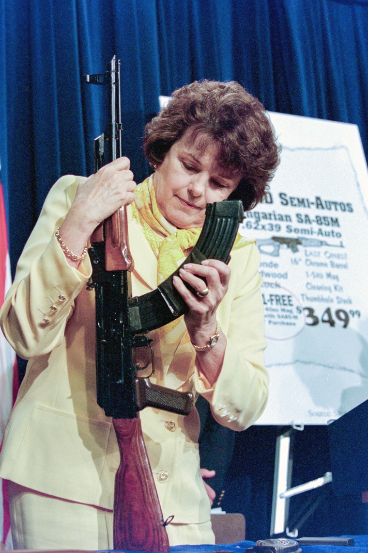 W5WRYF U.S Senator Dianne Feinstein, of California demonstrates an AK-47 military style assault weapons during a press conference on Capitol Hill March 22, 1998 in Washington D.C,. The Republican lead House of Representatives voted to lift the assault-type weapons ban by a vote of 239-173, but President Bill Clinton Administration has vowed to veto the measure.