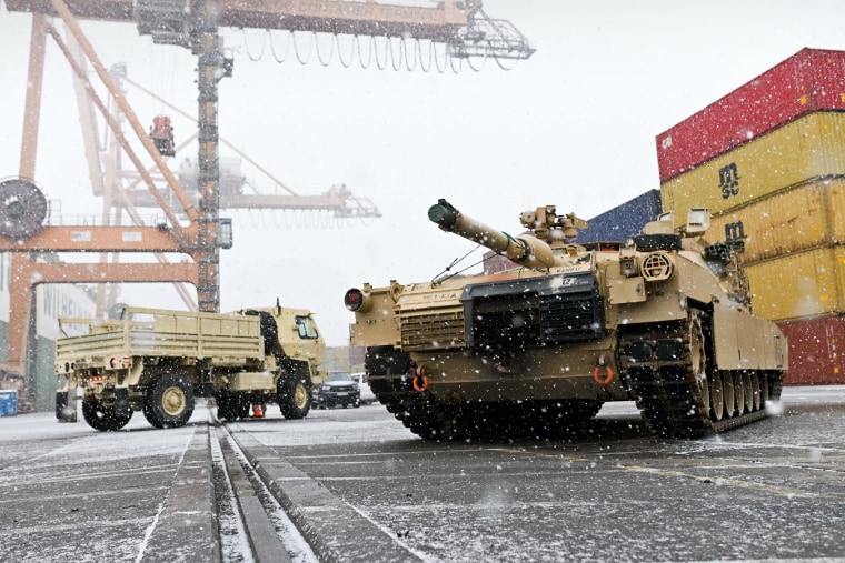 A U.S. Army M1A2 Abrams battle tank that will be used for military exercises is unloaded in Gdynia, Poland, on Dec. 3, 2022.