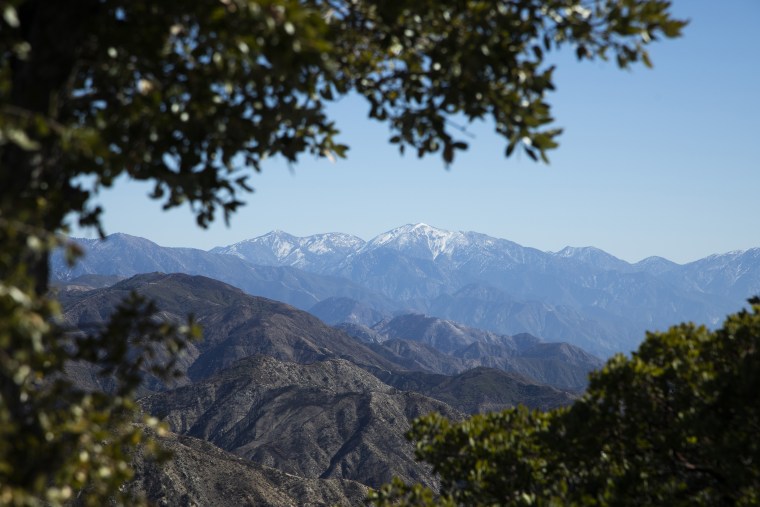 Snow-covered Mt. Baldy is visible from Mt. Disappointment Road in the San Gabriel Mountains. Multiple peaks can be hiked from Eaton Saddle, but currently the entrance to Mt. Wilson Red Box Road is closed to vehicle traffic requiring a 2.3 mile hike to the saddle trailhead. Alternatively, Mt. Disappointment Road and Bill Reily Trail can be used to hike in. Photographed on Thursday, Feb. 18, 2021 in Altadena, CA.