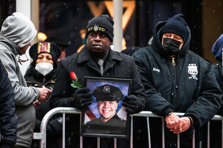 Thousands of NYPD officers attend the funeral of Officer Jason Rivera at St. Patrick's Cathedral on January 28, 2022 in New York.