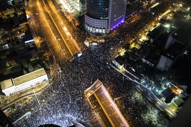 Tens of thousans of Israelis attend a protest against the new far-right government on Jan. 21, 2023 in Tel Aviv.