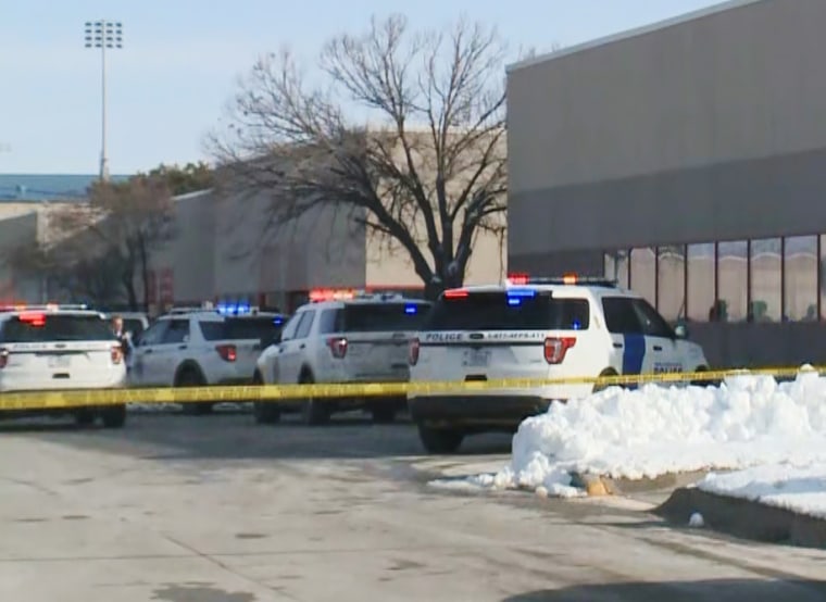 Police respond at the scene of a shooting near downtown Des Moines, Iowa, on Jan. 23, 2023.