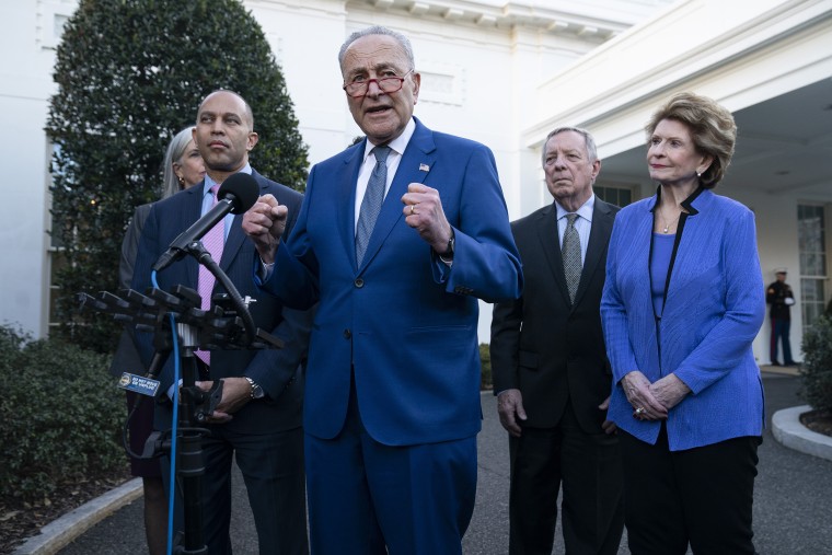 Senate Majority Leader Sen. Chuck Schumer of N.Y., speaks outside the White House after a meeting with President Joe Biden, Tuesday, Jan. 24, 2023, in Washington, as from left, House Minority Whip Katherine Clark of Mass., House Minority Leader Hakeem Jeffries of N.Y., Senate Majority Whip Dick Durbin of Ill., and Sen. Debbie Stabenow, D-Mich. (AP Photo/Evan Vucci)
