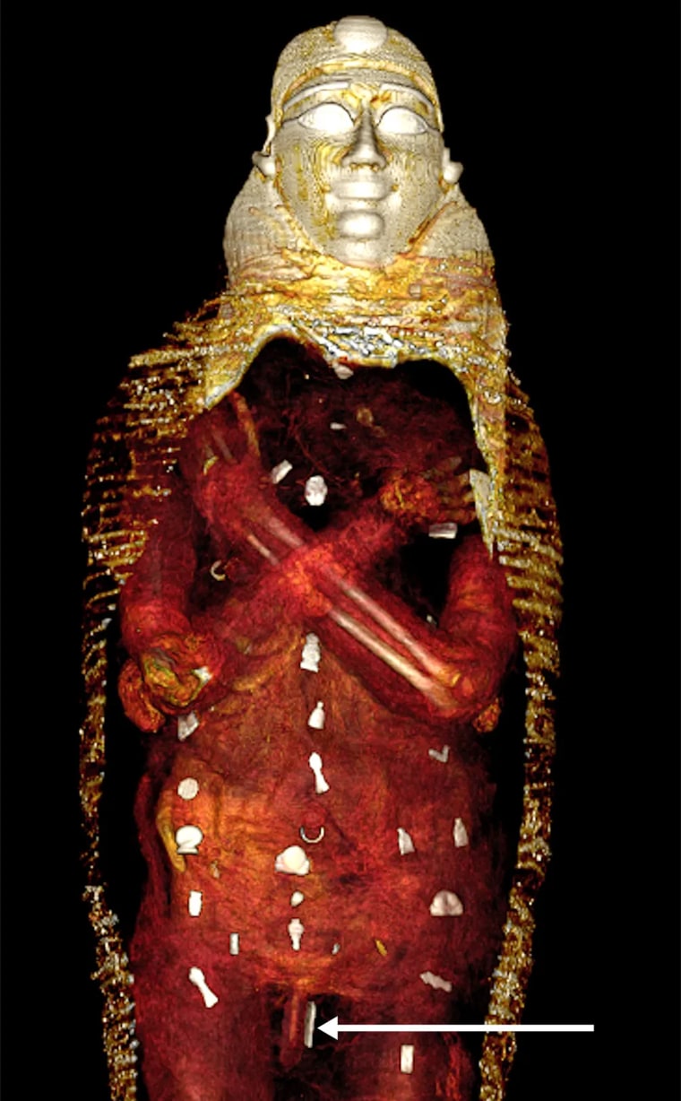 Wrappings are digitally removed to reveal amulets covering the body. 