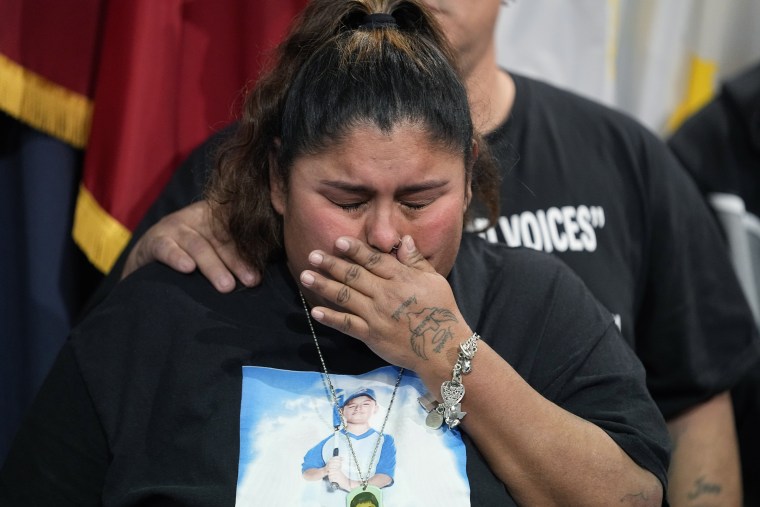 Felicia Martinez, mother of Xavier Lopez who was killed by a gunman at Robb Elementary School in Uvalde, Texas, tries to hold back tears after speaking at a news conference at the Texas Capitol with Texas State Sen. Roland Gutierrez in Austin on Jan. 24, 2023. 