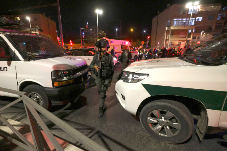 Israeli security forces deploy at the site of a reported attack in a settler neighborhood of Israeli-annexed east Jerusalem