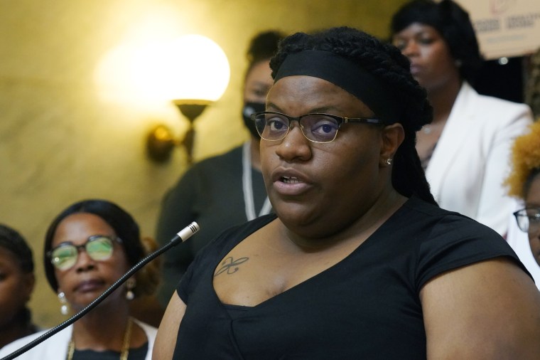 Brittany Lampkin speaks about the Mississippi Black Women's Roundtable legislative agenda  during a news conference at the Capitol in Jackson, Miss.
