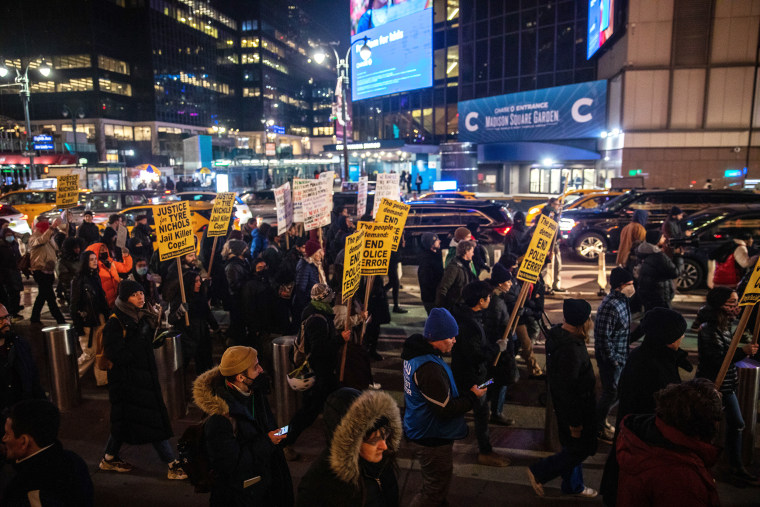 People protest in New York on Jan. 27, 2023, following the release of body cam footage showing Memphis police beating Tyre Nichols, who later died. Julius Constantine Motal / NBC News