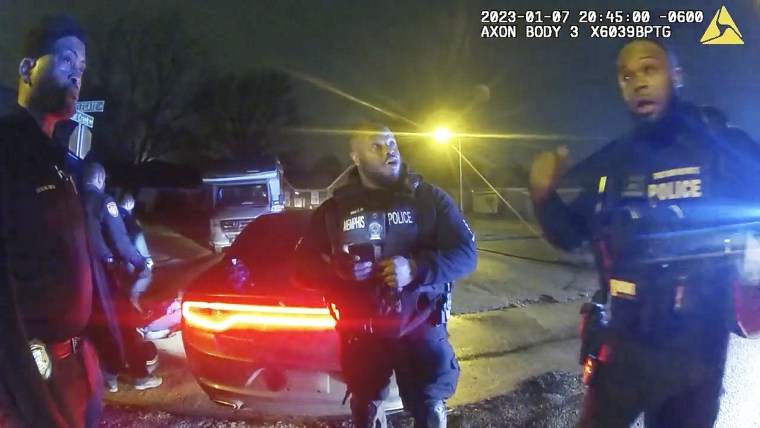 Police officers talk after the attack on Tyre Nichols during an arrest in Memphis, Tenn.
