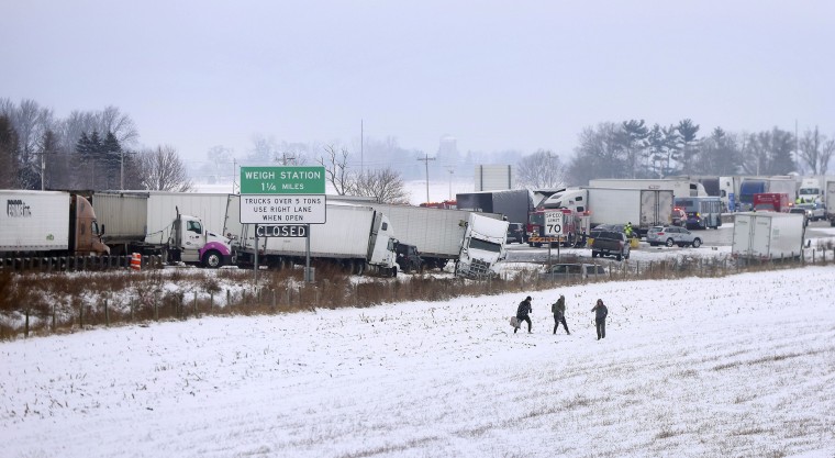 Emergency crews respond to a multi-vehicle accident in both the north and south lanes of Interstate 39/90 on Friday, Jan. 27, 2023, in Turtle, Wis.