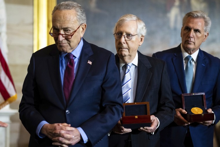 Senate Majority Major Chuck Schumer, D-N.Y., Senate Minority Leader Mitch McConnell, R-Ky., and then-House Minority Leader Kevin McCarthy, R-Calif., award Congressional gold medals on Dec. 6, 2022.