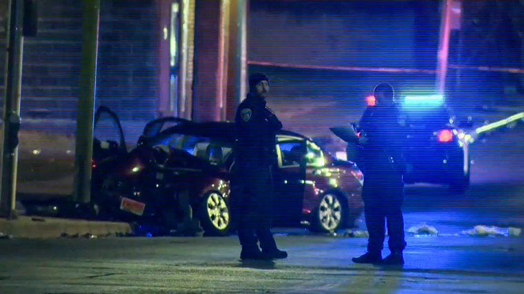 Police respond to the scene of a crash in Baltimore on Jan. 28, 2023.
