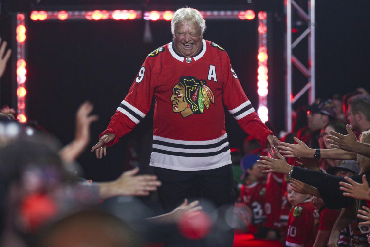 Former Chicago Blackhawks player Bobby Hull is introduced to fans during the NHL hockey team's convention in Chicago