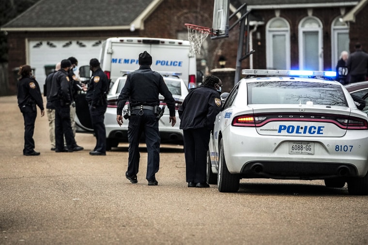 Image: Members of the Memphis Police Department work a crime scene in Memphis, Tenn., on Jan. 24, 2023.