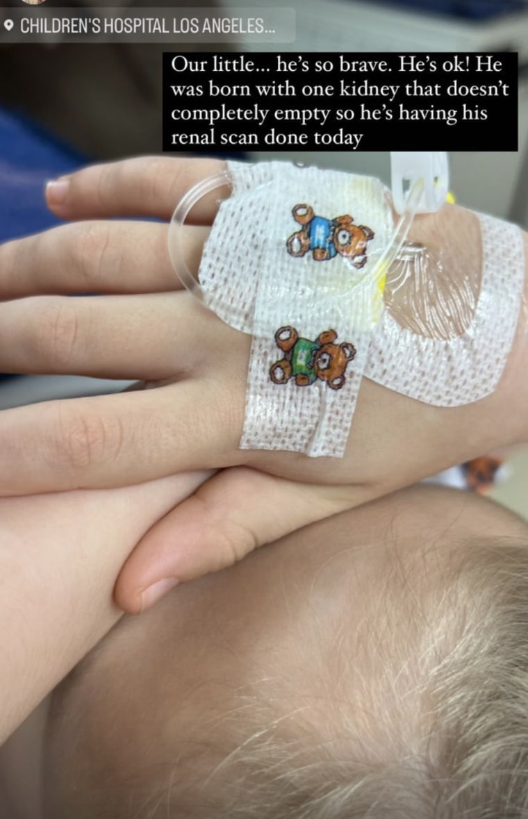 Tori Spelling's son hand with an IV.