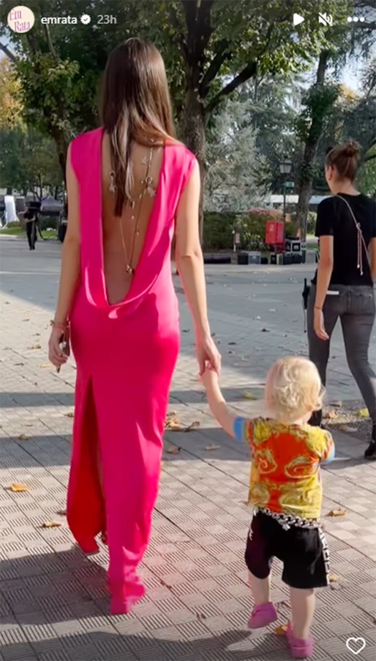 Mom and son in matching pink at the Versace shoot.