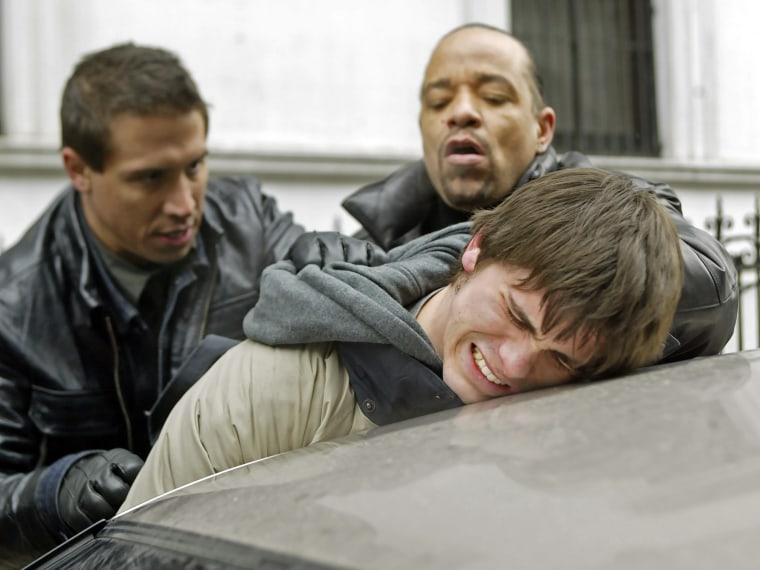 Erik Palladino and Ice-T play detectives pinning Jason Ritter's character against a car.
