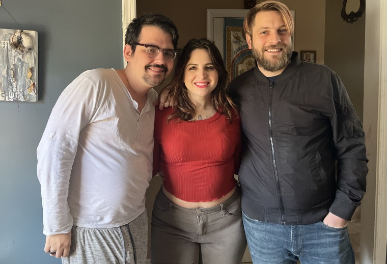 Jennifer Martin, pictured with her husband, Daniel, and her partner Ty Simpson.