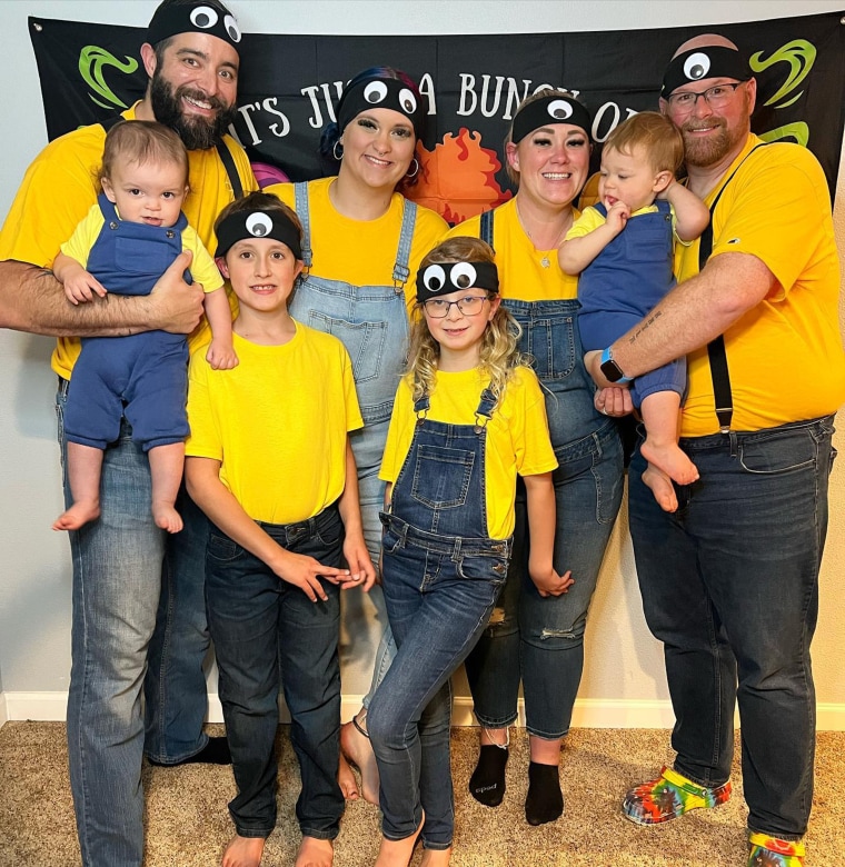 Alysia, Tyler, Sean and Taya, pictured with their four children on Halloween.